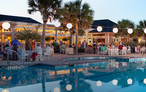 Event members partying at the pool