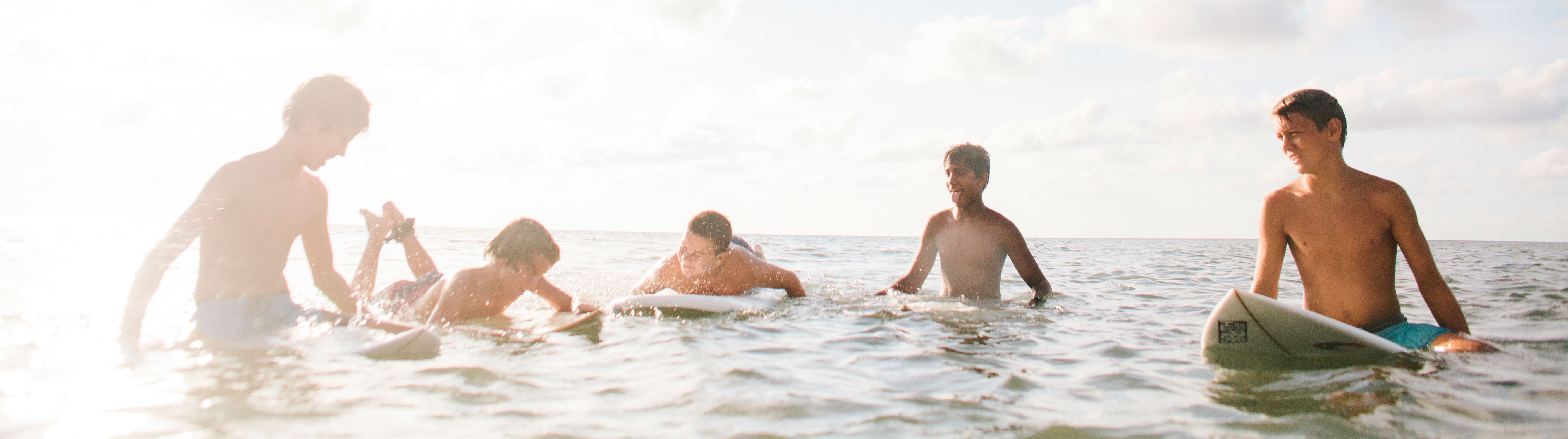 Boys enjoying beach activities